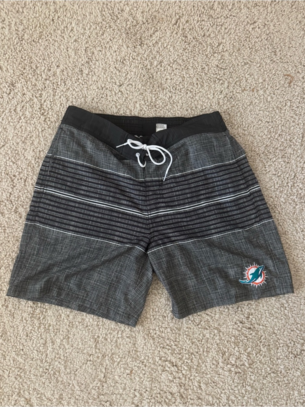 NFL Brand Men's Black and Gray Striped Athletic Shorts with Miami Dolphins Logo